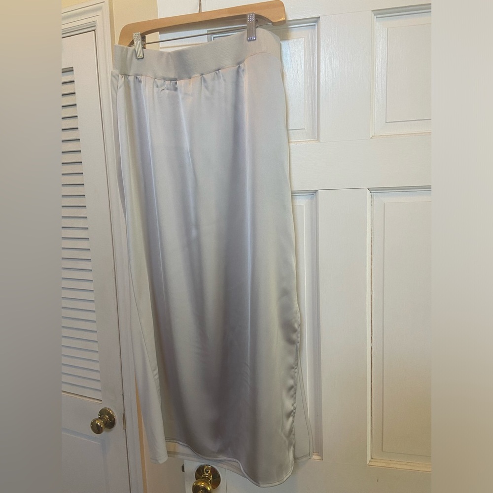 Long silver colored skirt with side slit